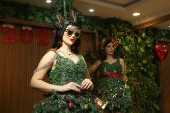 Models display Christmas and New Year-themed dresses at a wedding dress shop in Diyarbakir