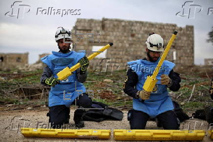 Syrian Civil Defense team clears unexploded ordnance in Idlib countryside