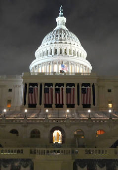 General view shows the West front of the U.S. Capitol building during snowfall in Washington