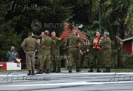 Soldiers prepare ahead of the expected arrival of released Israeli hostages, who have been held in Gaza since the deadly October 7, 2023 attack by Hamas, in Petah Tikva