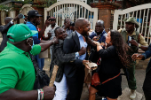 Kenyan activists and civil society representatives gather to deliver a list of people who disappeared during demonstrations against the government proposed tax hikes, in Nairobi