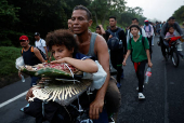 Migrant caravan continues on its way to the U.S. and Mexico border, in Villa Comaltitlan