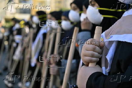 Hezbollah's Imam Al Mahdi Scouts clear debris in Beirut amid ceasefire with Israel