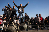 People gather in Umayyad Square after Syria's Bashar al-Assad was ousted in central Damascus