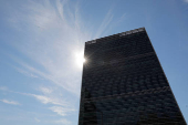 FILE PHOTO: The sun shines behind the United Nations Secretariat Building at the United Nations Headquarters in New York City