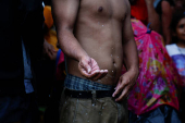 Migrant caravan stops to rest before moving on its way to the U.S.-Mexico border, in Escuintla