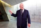 Ontario Premier Doug Ford speaks to journalists before a meeting with federal, provincial and territorial leaders at the Canadian War Museum in Ottawa