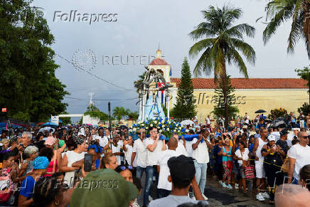 Cuban faithful carry out the traditional procession of the Virgin of Regla