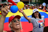 Government supporters participate in a march in support of Venezuelan President Nicolas Maduro's victory in the July 28 elections, in Caracas