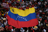 Government supporters participate in a march in support of Venezuelan President Nicolas Maduro?s victory in the July 28 elections, in Caracas