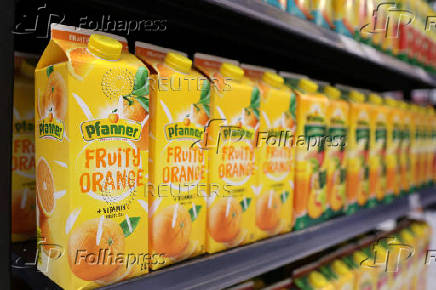 Pfanner products are displayed on a shelf in a supermarket