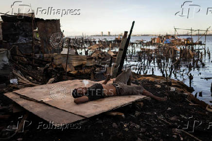 Aftermath of a fire at a slum area in Manila