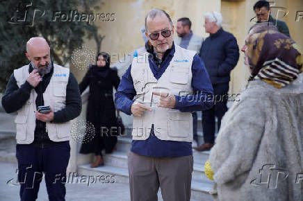 UNICEF Deputy Executive Director, Ted Chaiban, talks as he visits a damaged school in Aleppo