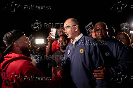 FILE PHOTO: United Auto Workers union President Shawn Fain joins UAW members on a strike in Wayne