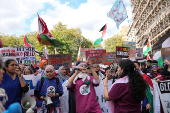 People demonstrate in support of Palestinians in Gaza, in London