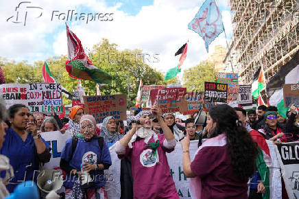 People demonstrate in support of Palestinians in Gaza, in London