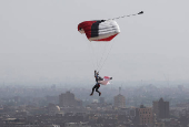 A professional skydiver flies on the outskirts of Egypt's capital Cairo during Egypt International Skydiving Festival 