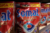 Somat products are displayed on a shelf in a supermarket