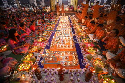 Hindu devotees take part in Rakher Upobash ritual, in Dhaka