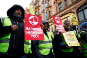 Harrods staff strike for Christmas bonus and better conditions.