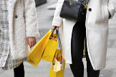 Shoppers walk on Oxford Street in London