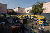 Ice cream carts are parked on a hot summer day in New Delhi