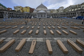 Cardboard coffins fill Naples square to denounce work-related deaths in Italy