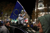 Protest against the results of a parliamentary election on the eve of the new parliament's first session, in Tbilisi