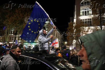 Protest against the results of a parliamentary election on the eve of the new parliament's first session, in Tbilisi