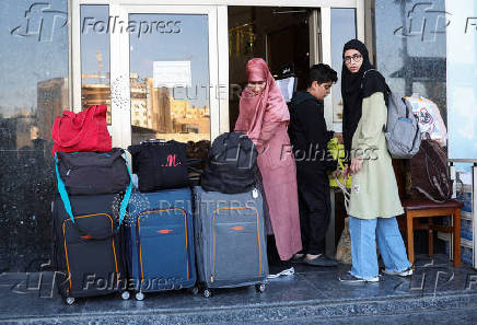 Displaced Lebanese, who had fled to Iraq, prepare to head back home after a ceasefire between Israel and the Lebanese armed group Hezbollah took effect, in Karbala