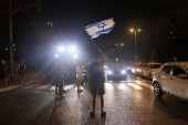 People attend a protest against the government and to show support for the hostages who were kidnapped during the deadly October 7 attack, in Tel Aviv