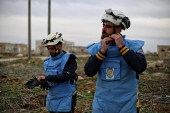 Syrian Civil Defense team clears unexploded ordnance in Idlib countryside