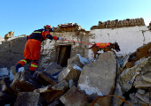 Firefighter conducts search and rescue operation after earthquake in Tibet