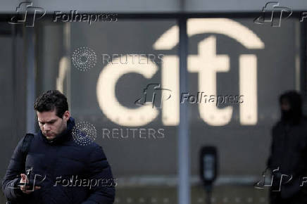 FILE PHOTO: Workers exit the Citi Headquarters in New York