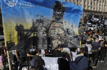 Ukrainians take part in procession for the 'Day of Defenders of Ukraine' in Kyiv