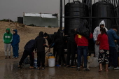 Heavy rain flooded tents in Khan Yunis camp