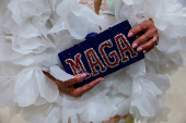 Karen Gonzalez Pittman, a State Rep. of the Florida House of Representative from the 65th district, shows her MAGA handbag before attending the Sunshine Ball in Washington