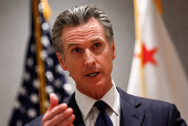FILE PHOTO: Governor of U.S. state of California Gavin Newsom speaks at a press conference in Beijing
