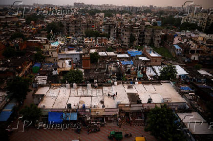 A view shows roofs of shanties painted with solar reflective paint in a slum area in Ahmedabad,