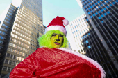 Revellers take part in SantaCon in New York City