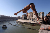 Traditional New Year's diving into the Tiber River in Rome