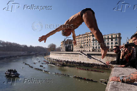 Traditional New Year's diving into the Tiber River in Rome