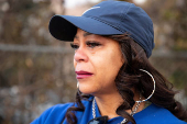 Desiree Johnson views her home that was destroyed by the Eaton Fire in Altadena