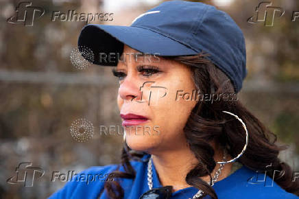 Desiree Johnson views her home that was destroyed by the Eaton Fire in Altadena