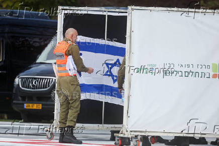 Soldiers prepare a helipad, ahead of the expected arrival of released Israeli hostages, who have been held in Gaza since the deadly October 7, 2023 attack by Hamas, in Petah Tikva