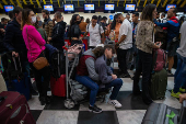 Saguo do aeroporto de Congonhas lotado de passageiros