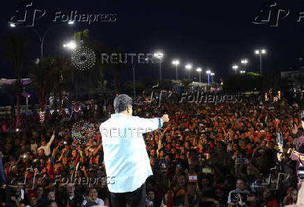 Venezuela's President Nicolas Maduro gives a speech to supporters to celebrate two months of his victory in the July 28 election