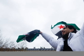 Celebrations in Paris after Syrian rebels capture Damascus and overthrow al-Assad