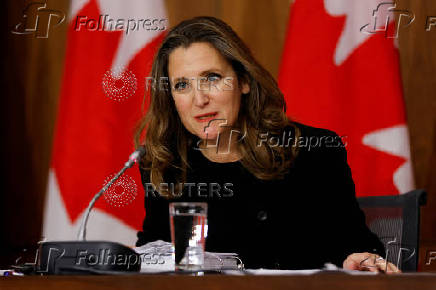 FILE PHOTO: Canada's Finance Minister Chrystia Freeland speaks to news media in Ottawa