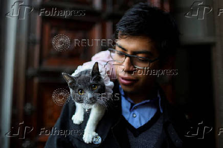 People bring their pets to be blessed on Saint Anthony's day, on the outskirts of Mexico City